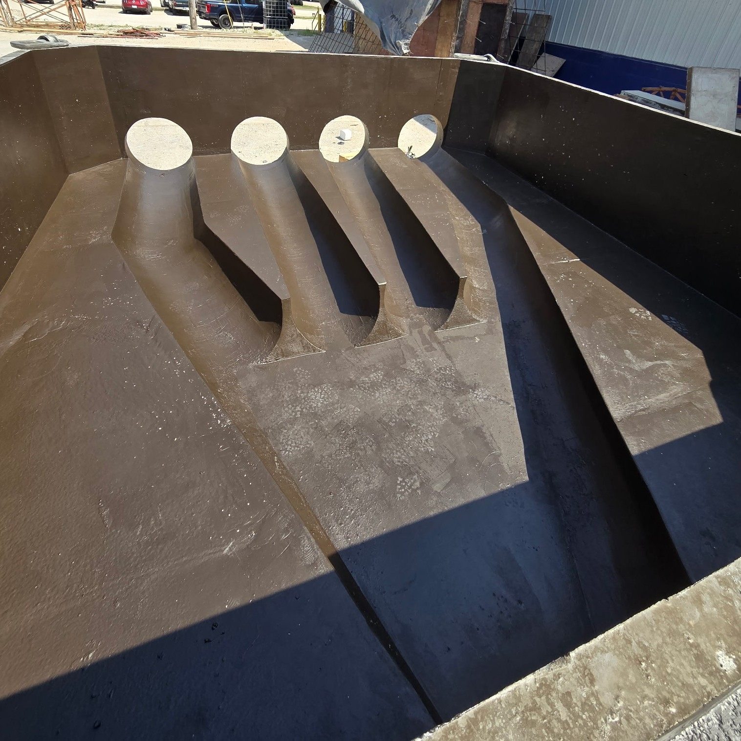 Custom polymer concrete flow channels and penetrations