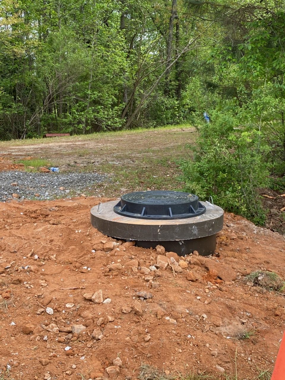 Completed polymer concrete rehabilitation insert with cover installed